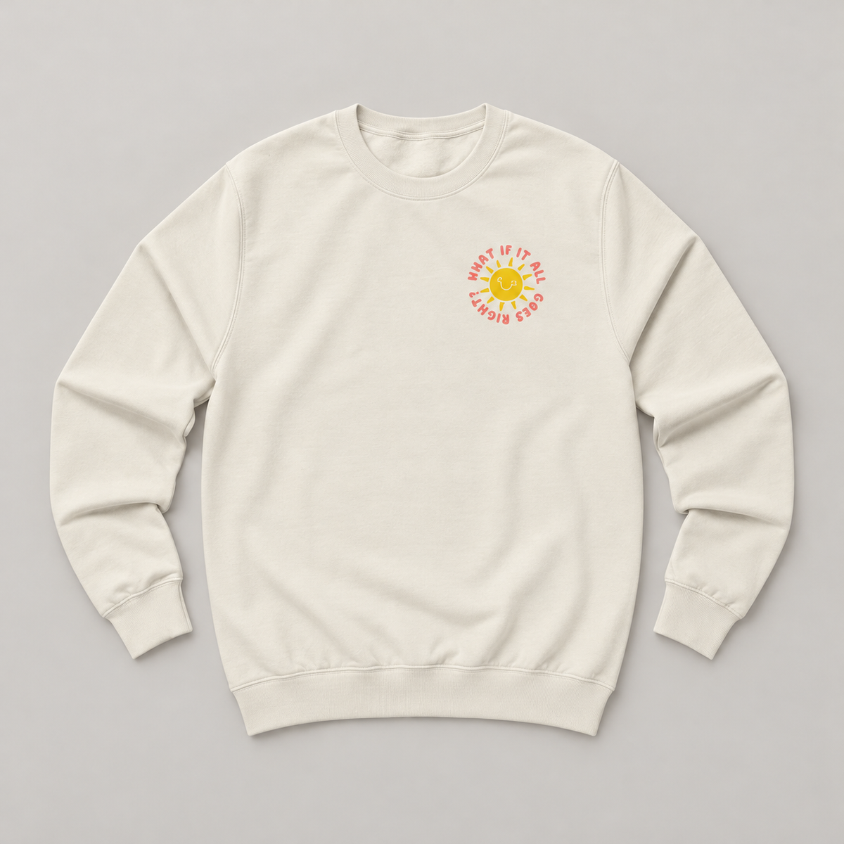 Cream What If It All Goes Right sweatshirt with a sunshine chest design on a light grey background